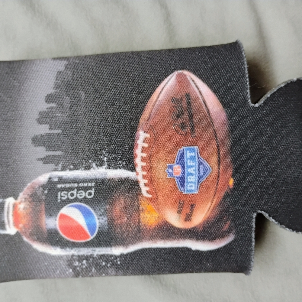 Pepsi NFL Draft Football Koozie with Black and Brown Design 2023 Dratt